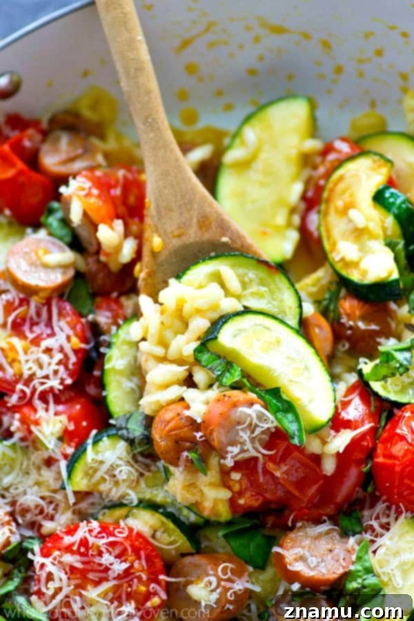 Sun-Drenched Sausage and Garden Risotto 7 Generous serving of Summer Garden Vegetable Sausage Risotto with fresh herbs