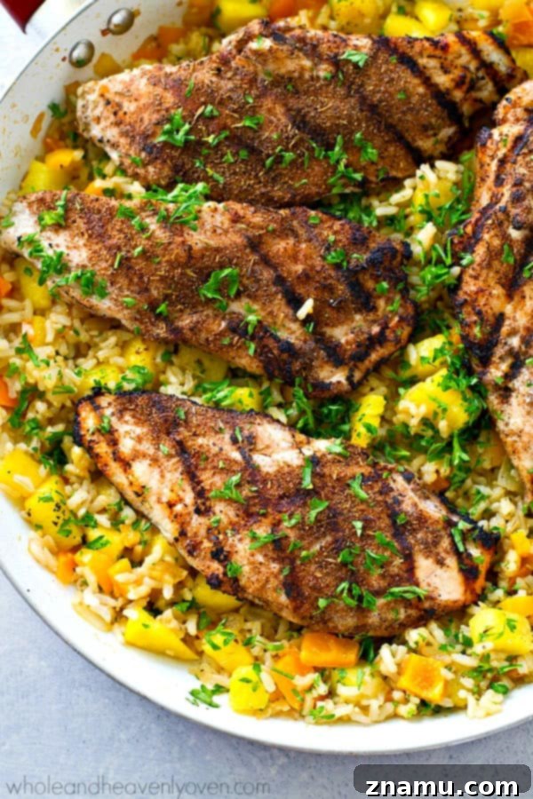Fiery Jerk Chicken & Golden Pineapple Rice 2 Sweet 'n' spicy grilled jerk chicken is the perfect match for tropical fried rice with plenty of fresh pineapple.---This 20-minute dinner is SO easy to throw together for a busy weeknight.