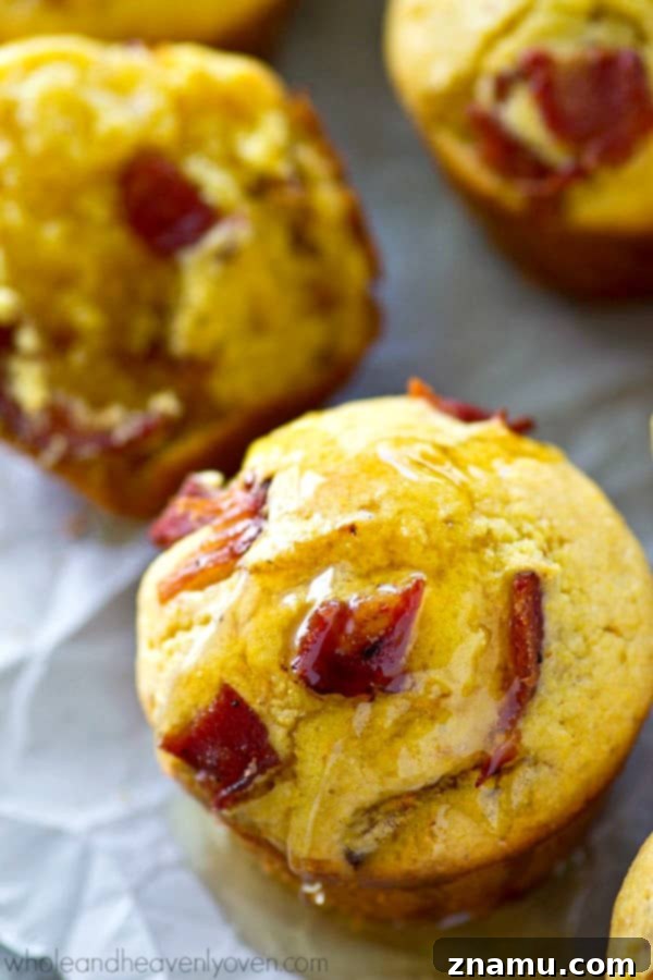 Brown Butter Bacon Cornbread Muffins 2 Crispy bacon bits adding texture to fluffy cornbread muffins, a perfect blend of savory and sweet.
