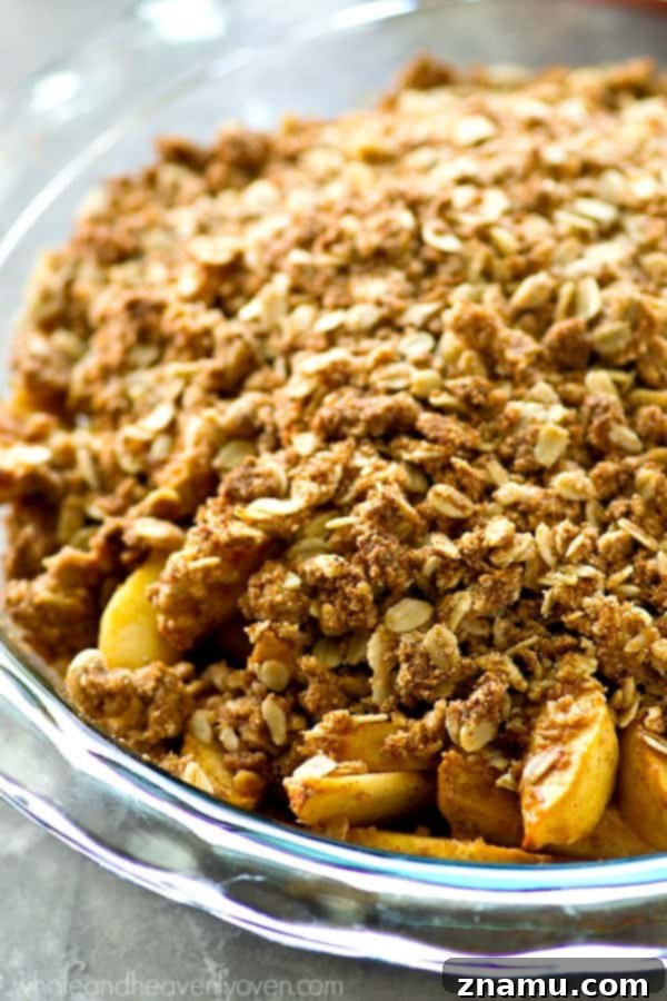 Apple Crisp with Peanut Butter Oat Topping 3 Close-up of baked apple crisp with a golden peanut butter oat topping
