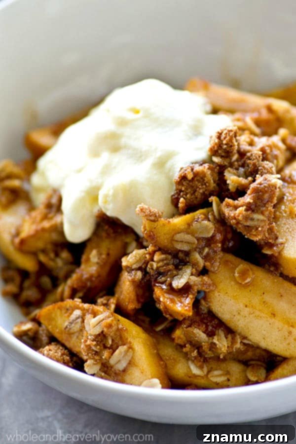 Apple Crisp with Peanut Butter Oat Topping 6 Baked Peanut Butter Oatmeal Apple Crisp served warm with a generous dollop of whipped cream