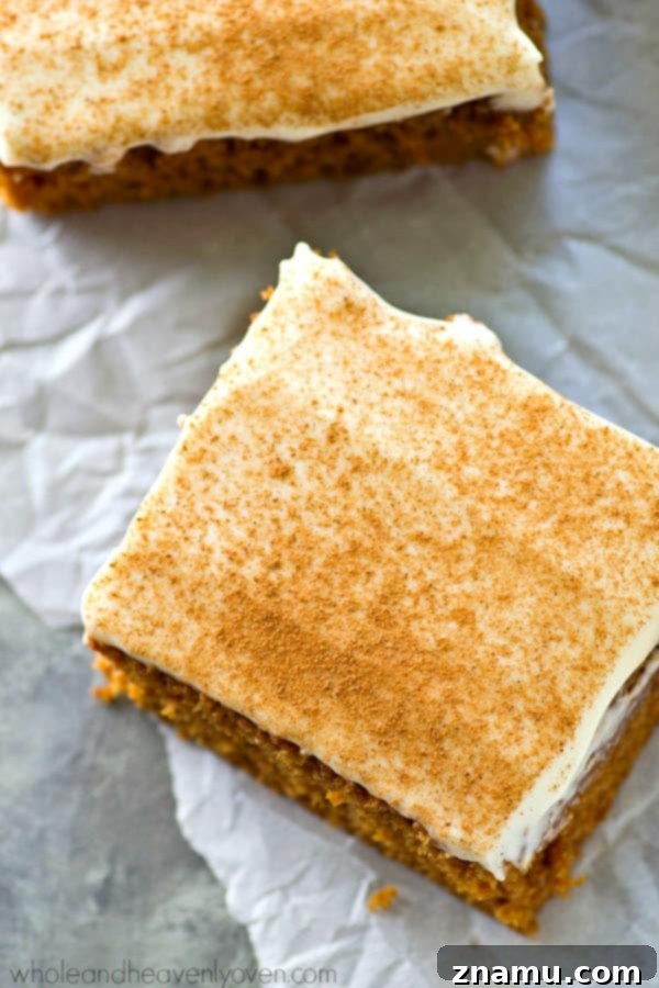Spiced Applesauce Snack Cake with Cream Cheese Frosting 2 Soft and moist applesauce snack cake with cream cheese frosting, perfect for fall