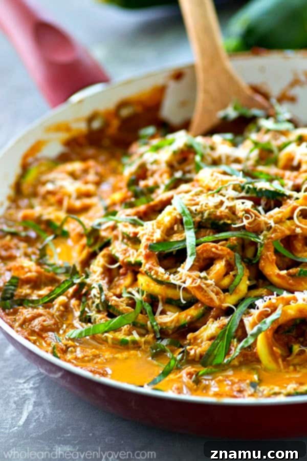 Creamy Sun-Dried Tomato Zucchini Alfredo Noodles 3 Close-up of Sun-Dried Tomato Alfredo Zucchini Noodles in a skillet