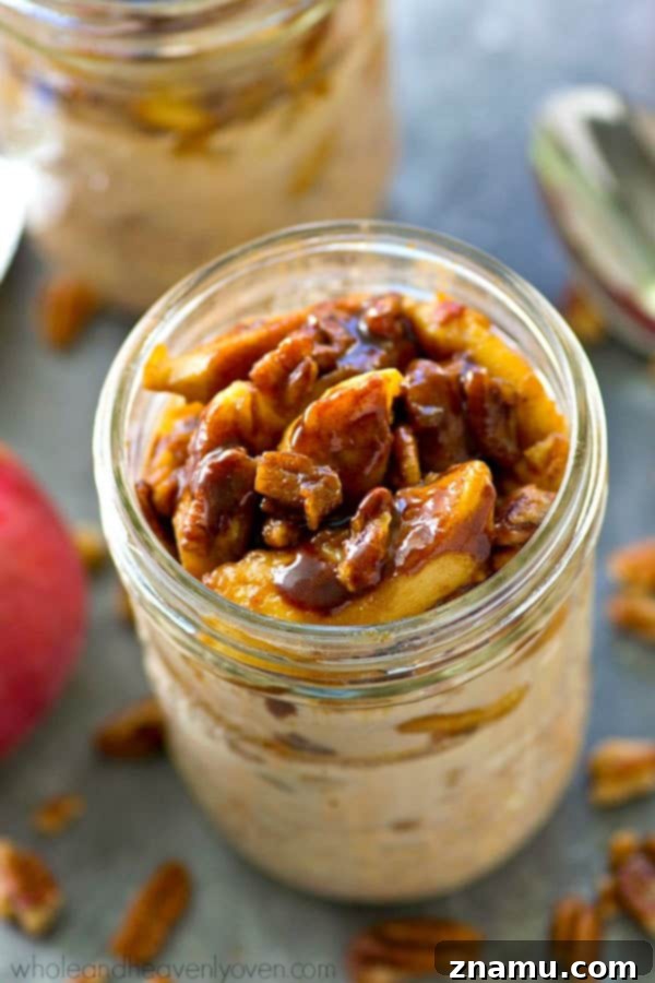 Close-up of creamy Caramelized Apple Cinnamon Roll Overnight Oats, showcasing a rich texture.