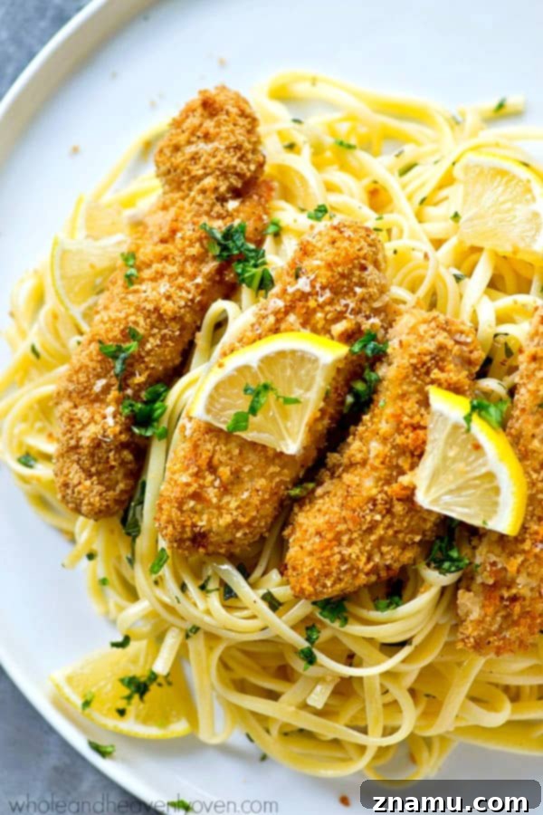 Crispy Lemon Parmesan Chicken Tenders with Aromatic Herb Pasta 6 Crispy lemon Parmesan baked chicken strips and buttery herb noodles make for one unbelievably fast and easy, yet totally insanely flavorful dinner that everyone will gladly gobble up!