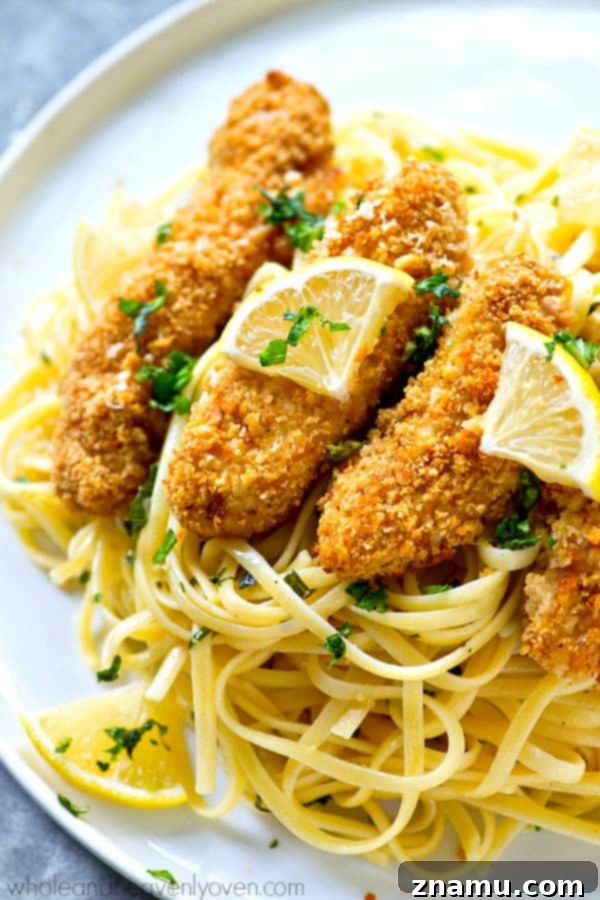Crispy Lemon Parmesan Chicken Tenders with Aromatic Herb Pasta 7 Crispy lemon Parmesan baked chicken strips and buttery herb noodles make for one unbelievably fast and easy, yet totally insanely flavorful dinner that everyone will gladly gobble up!