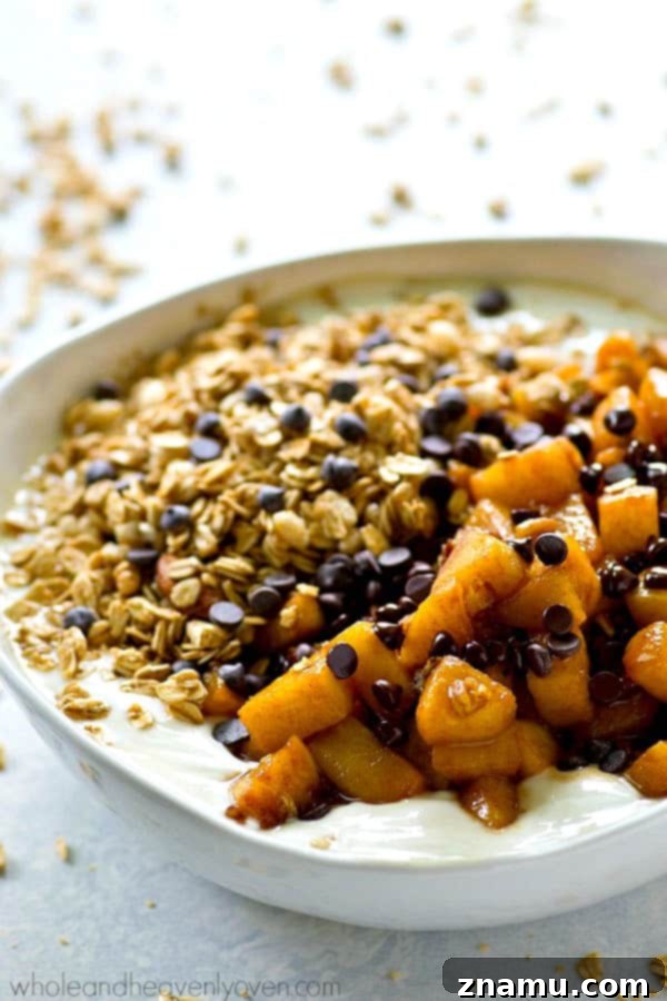 Caramel Apple Pie Flavored Granola Yogurt Bowls 7 Multiple Caramel Apple Pie Granola Yogurt Bowls lined up, beautifully garnished and ready to be served for a festive fall breakfast.