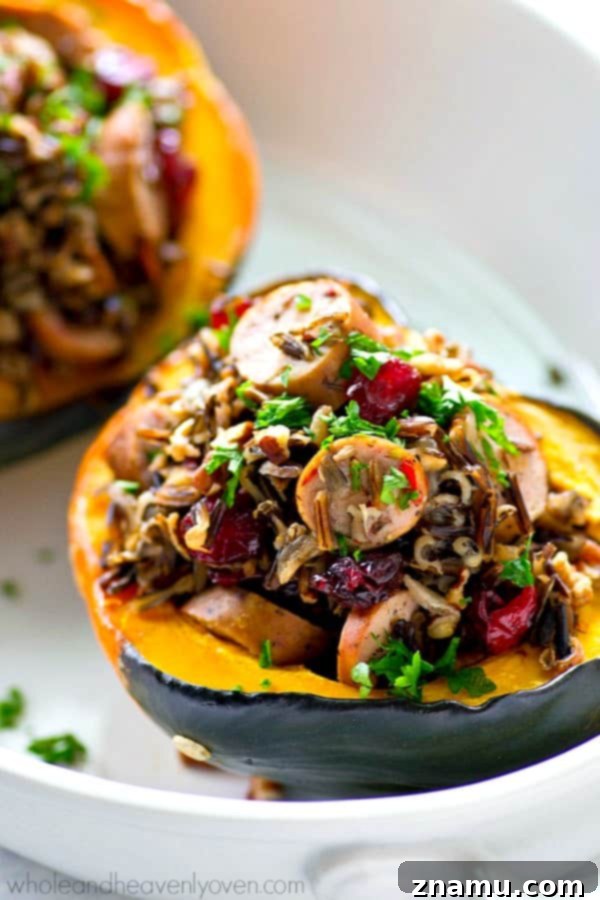 Wild Rice Sausage and Cranberry Stuffed Acorn Squash Boats 3 Stuffed Acorn Squash with Wild Rice and Sausage, a perfect fall side dish for holidays.
