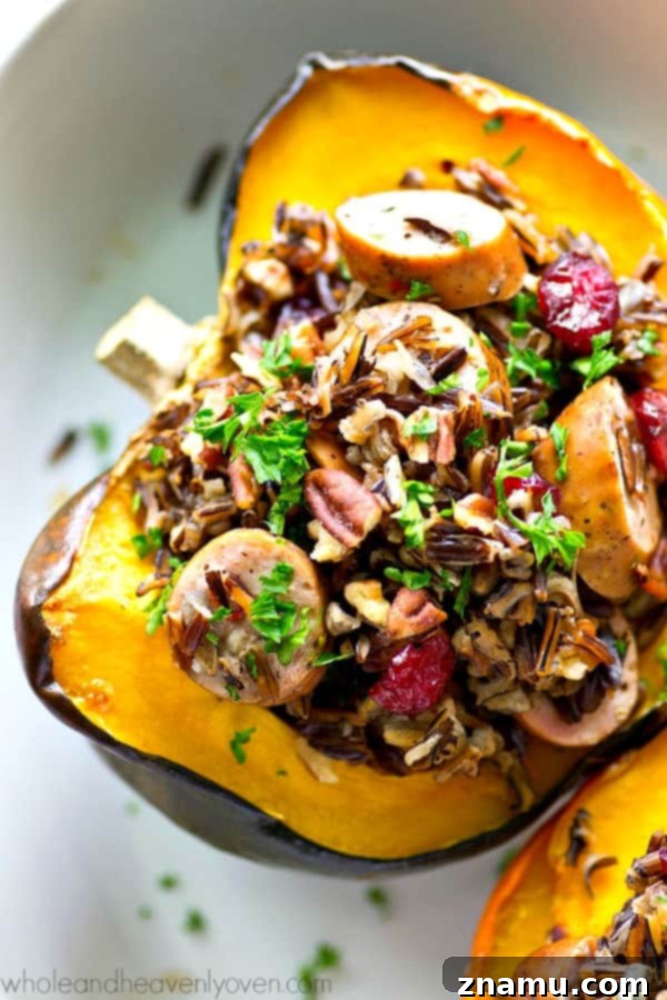 Wild Rice Sausage and Cranberry Stuffed Acorn Squash Boats 6 Stuffed acorn squash boats ready for the oven, filled with wild rice, sausage, cranberries, and pecans.