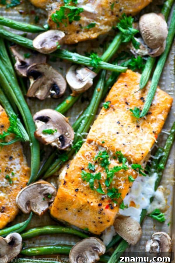 One Pan Lemon Garlic Parmesan Salmon with Green Beans and Mushrooms 5 Roasted in a flavorful lemon garlic Parmesan sauce and lots of little mushrooms and green beans, this baked salmon is a breeze to throw together for a weeknight dinner and is packed with SO many amazing flavors!