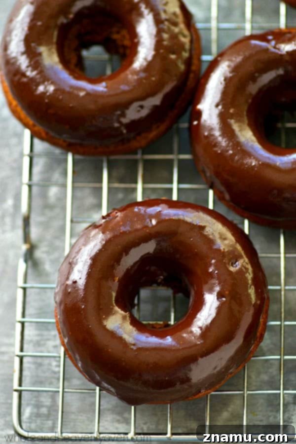 Glazed Mocha Banana Baked Delights 3 A plate of freshly baked mocha banana donuts ready for glazing