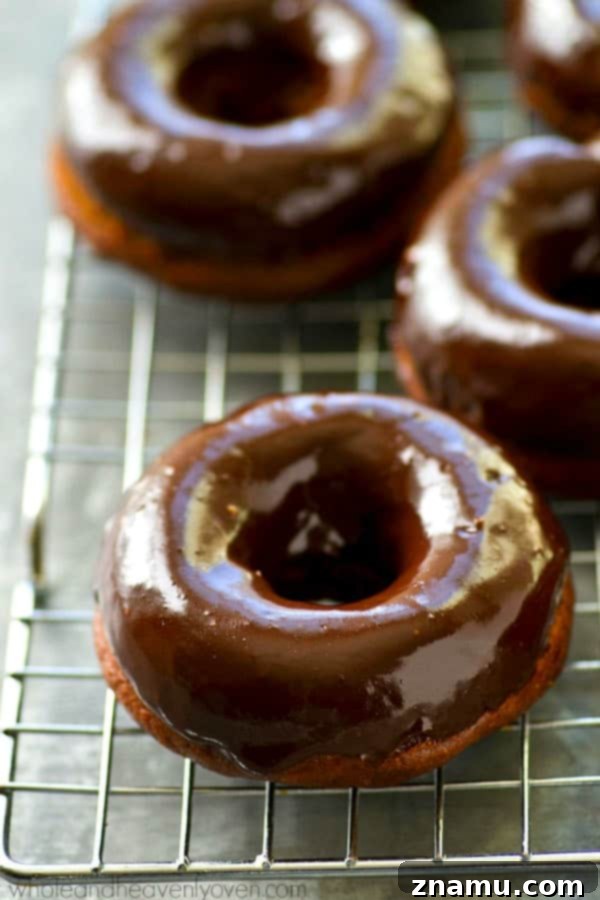 Glazed Mocha Banana Baked Delights 6 Close-up of a glazed mocha banana baked donut showing its rich topping