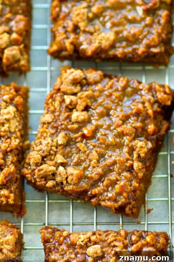 Spiced Pumpkin Caramel Crumble Bars 6 The pumpkin pie base for crumb bars spread in a baking pan