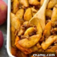 Sweet potato casserole gets an incredible makeover with this SUPER-easy version that features tons of tender caramelized apples piled on top.---Everyone will want seconds of this winner casserole!