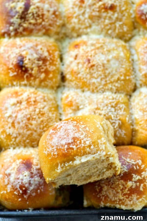 Golden Garlic Parmesan Potato Buns 5 Fluffy mashed potatoes and lots of flavorful roasted garlic and Parmesan cheese give these pretty dinner rolls the most unmatchable fluffy texture and incredible flavor!