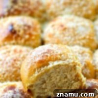Golden Garlic Parmesan Potato Buns 9 Fluffy mashed potatoes and lots of flavorful roasted garlic and Parmesan cheese give these pretty dinner rolls the most unmatchable fluffy texture and incredible flavor!