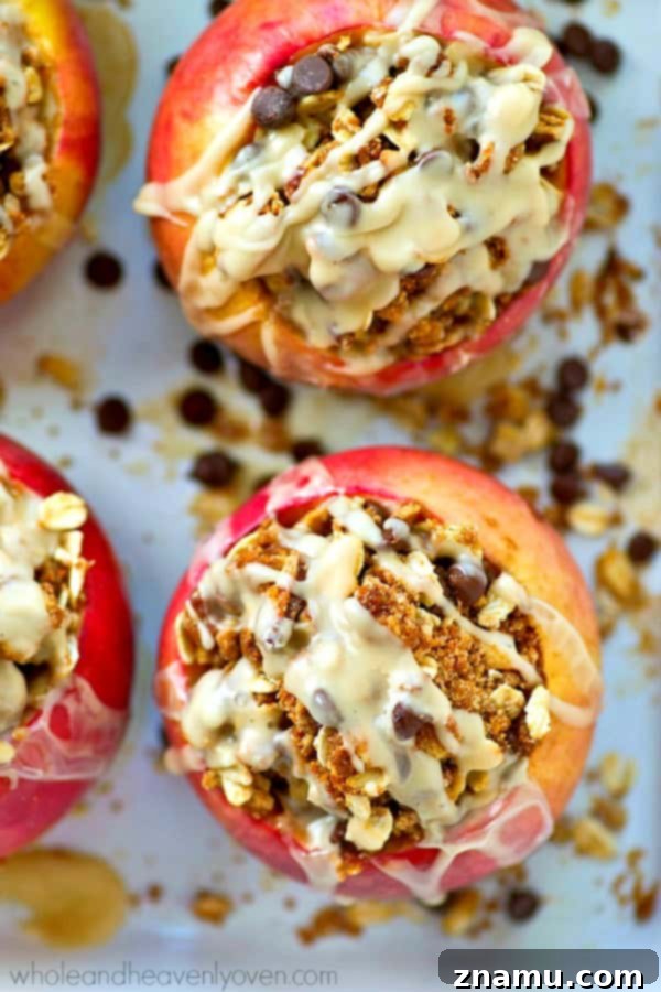 Chocolate Chip Iced Oatmeal Baked Apples 7 Oven-baked apples cooling, filled with delicious oatmeal chocolate chip cookies and awaiting a sweet vanilla icing.