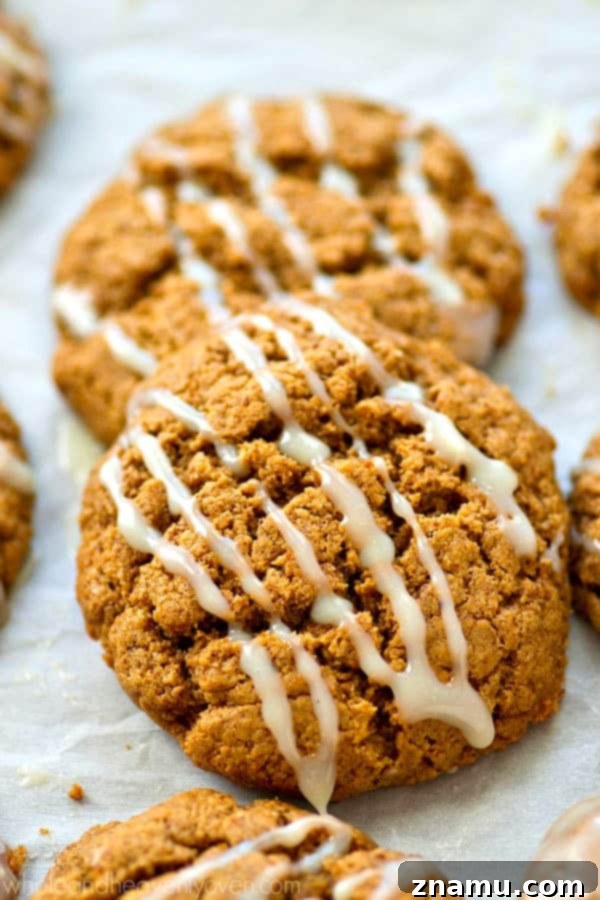 A perfectly baked, flourless white chocolate gingersnap, ready for a delicious bite.