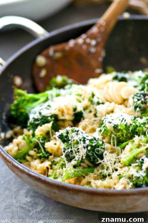 Comforting Roasted Garlic Broccoli Parmesan Risotto 7 Serving of Roasted Garlic Broccoli Parmesan Risotto, topped generously with Parmesan cheese
