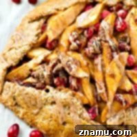 Chai spice glazed pear cranberry galette, a perfect holiday dessert.