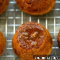 Zingy Sticky Orange Gingerbread Muffins 9 Small image of a sticky orange gingerbread muffin, indicating the recipe.