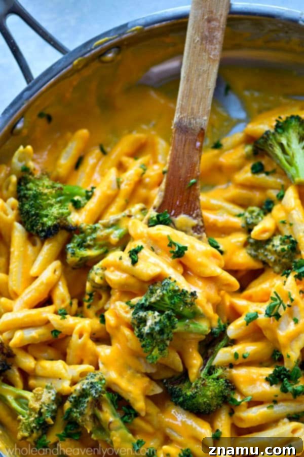 Creamy Butternut Squash and Roasted Broccoli Penne Skillet 2 Indulgently creamy butternut squash alfredo penne skillet with roasted broccoli, a quick 30-minute recipe for a delightful weeknight dinner.