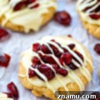 Blissful Cranberry White Chocolate Sugar Cookies 9 Love the cranberry bliss bars from Starbucks? You've GOT to try them in festive sugar cookie form! You won't believe how easy these little cookie gems are to make.
