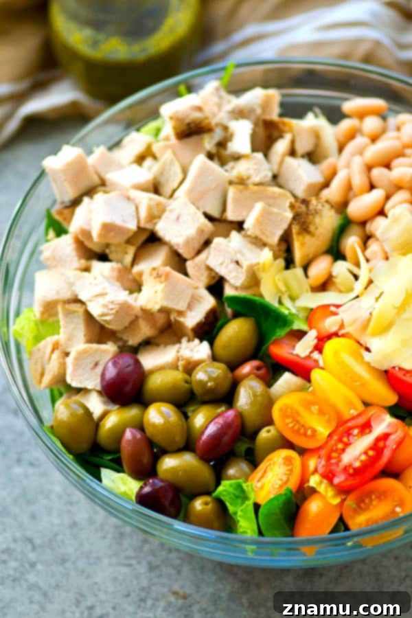 A Taste of Tuscany: Turkey & Pesto Salad 5 A close-up view of the prepared Tuscan turkey salad, showcasing its rich textures and inviting colors before dressing.