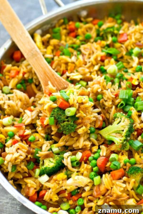 Vibrant Veggie Orzo Skillet 4 A healthy and quick vegetarian fried orzo skillet, perfect for a busy weeknight.