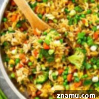 This healthier vegetarian take on classic fried rice uses orzo instead of rice and a rainbow of fresh vegetables! You'll only need a few ingredients and 30 minutes to put it on the dinner table.