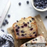 Sunshine Blueberry Banana Bread with Zesty Citrus Glaze 8 This blueberry banana bread is incredibly soft inside, studded with juicy blueberries, and topped with a creamy citrus glaze.