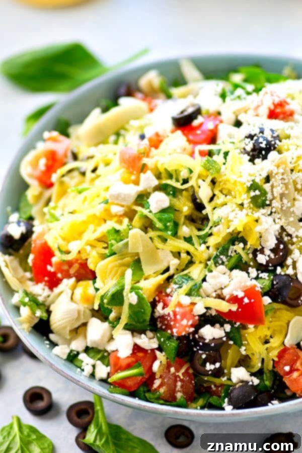 Greek salad gets a fun makeover with the addition of spaghetti squash and an incredible lemon-y garlic vinaigrette. This easy spaghetti squash salad is practically a meal in itself!