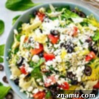 Greek salad gets a fun makeover with the addition of spaghetti squash and an incredible lemon-y garlic vinaigrette. This easy spaghetti squash salad is practically a meal in itself!