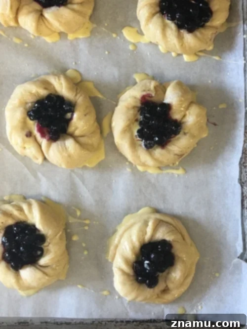 The Culinary Crucible: Volume Three 12 Freshly baked Danish pastries, golden brown and glistening