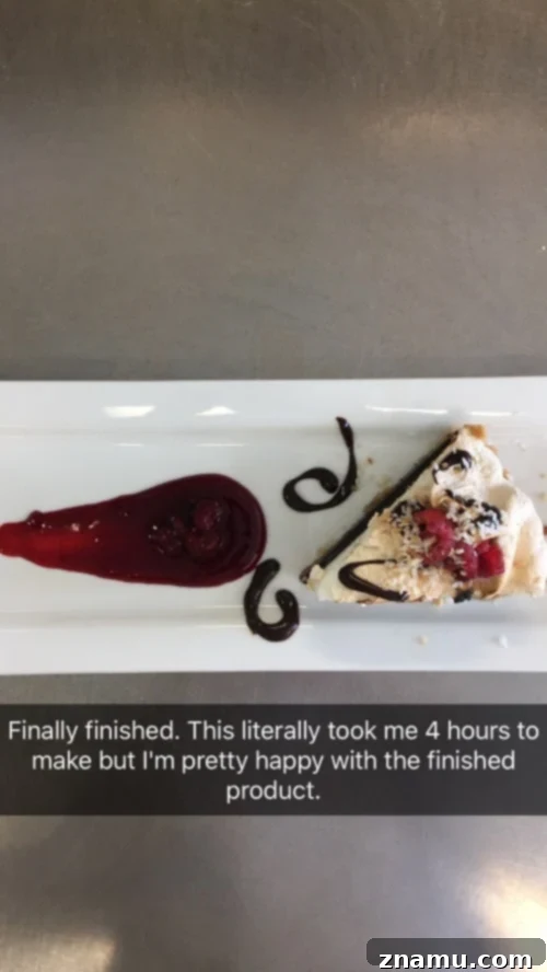 The Culinary Crucible: Volume Three 23 My signature dessert: a coconut chocolate shortbread tart with meringue, mocha ganache, and raspberry reduction