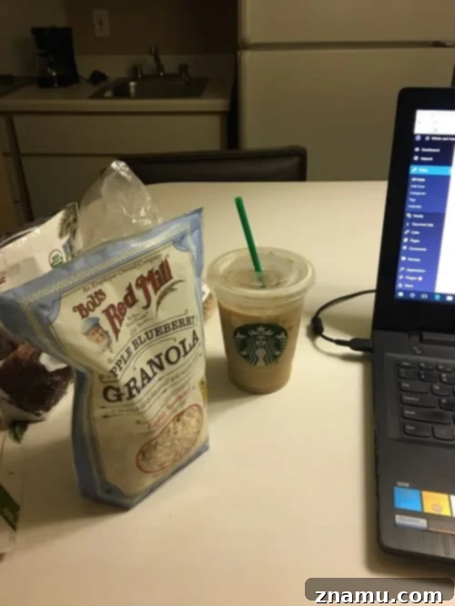 The Culinary Crucible: Volume Three 41 Coffee cup next to a bakery treat on a table