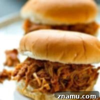 Sweet and Smoky Crockpot Chipotle Maple BBQ Chicken Sandwiches 7 Smothered in a sweet 'n' spicy chipotle maple bbq sauce and unbelievably tender, these crockpot bbq chicken sandwiches are the ultimately easy comfort food!