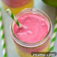 Thumbnail image of the finished layered mango raspberry smoothie.