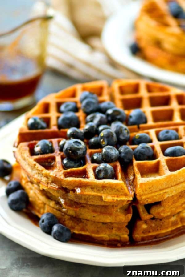 Golden Coconut Waffles with Spiced Maple Chai 6 Plates of crispy coconut oil waffles with fresh fruit and chai maple syrup.