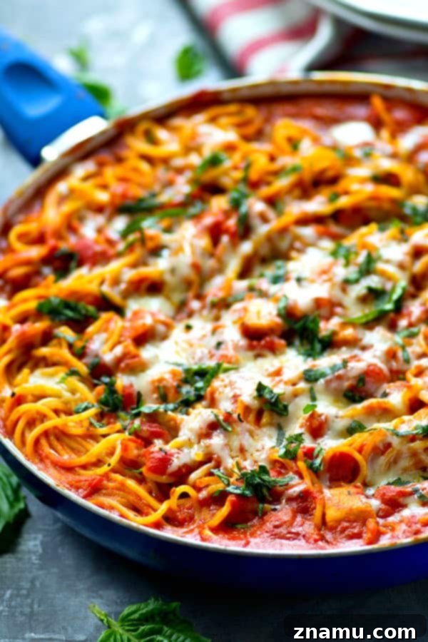 One-Pan Creamy Chicken Tomato Basil Spaghetti 5 Cooking chicken, onion, and garlic in a large skillet