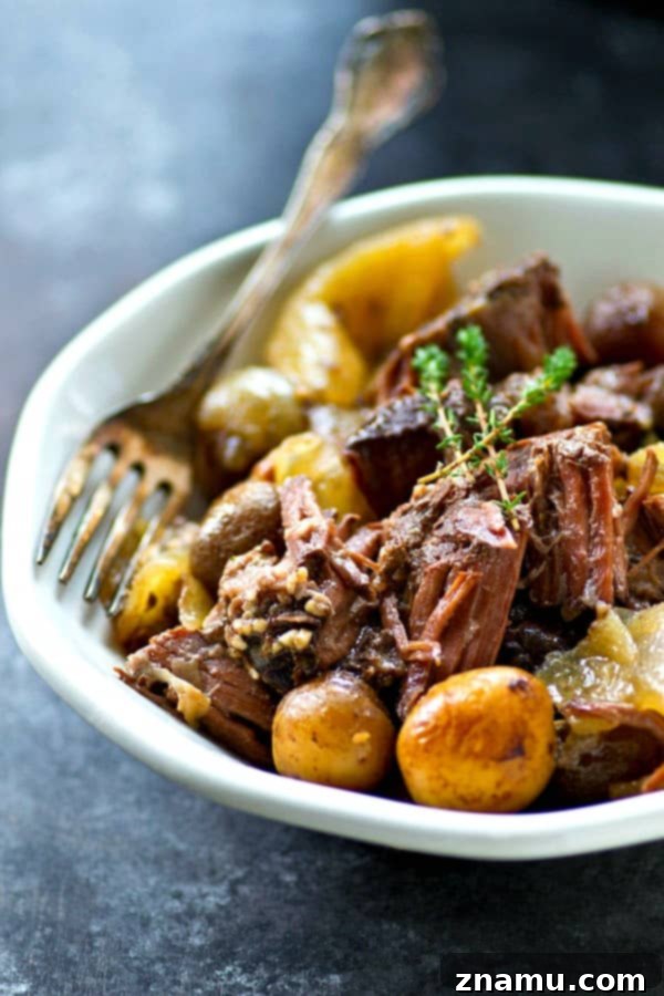 Rustic Wine-Braised Beef with Fingerling Potatoes 4 Seasoned beef roast being seared in a skillet before going into the crockpot