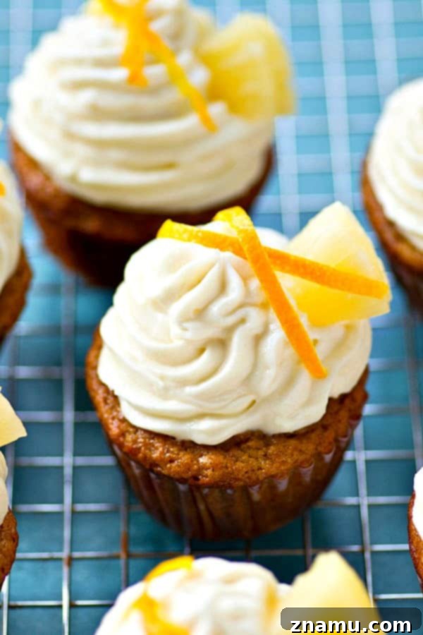 Pineapple Banana Paradise with Zesty Cream Cheese 2 Delicious Pineapple Banana Cupcakes with Citrus Cream Cheese Frosting, perfect for spring.