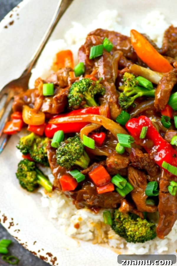 Fast Skillet Mongolian Delight 4 Juicy slices of Mongolian beef and stir-fried vegetables glistening with sauce in a hot skillet.