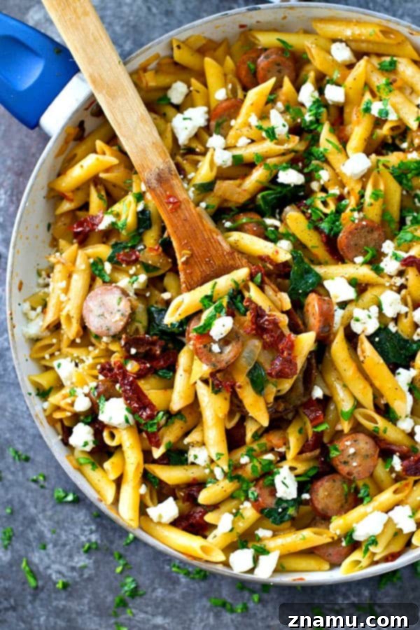 One-Pan Sun-Dried Tomato Sausage & Feta Penne 6 A large Sun-Dried Tomato Penne Skillet, freshly cooked and steaming, ready to be served