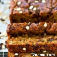 This super-moist loaded banana bread tastes like an oatmeal chocolate chip cookie and banana bread all rolled into one! Watch the entire loaf disappear before your very eyes.