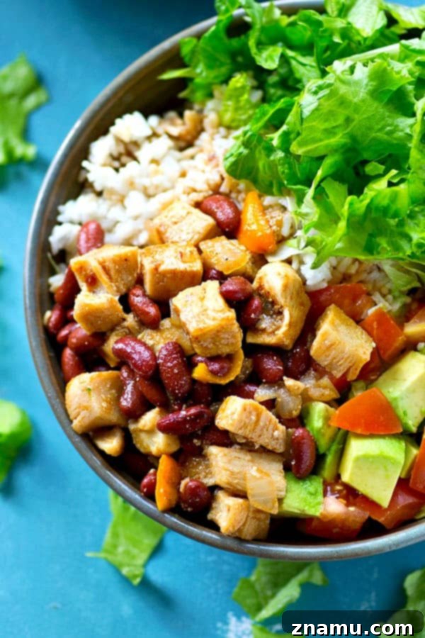 Southwest Chipotle Chicken Bowls 5 Cooking the spicy chicken and bean mixture in a skillet for rice salad bowls
