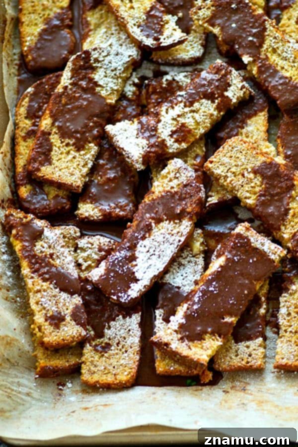 Decadent Espresso French Toast Sticks with Mocha Glaze 3 Close-up of golden brown espresso baked french toast sticks, ready for mocha glaze