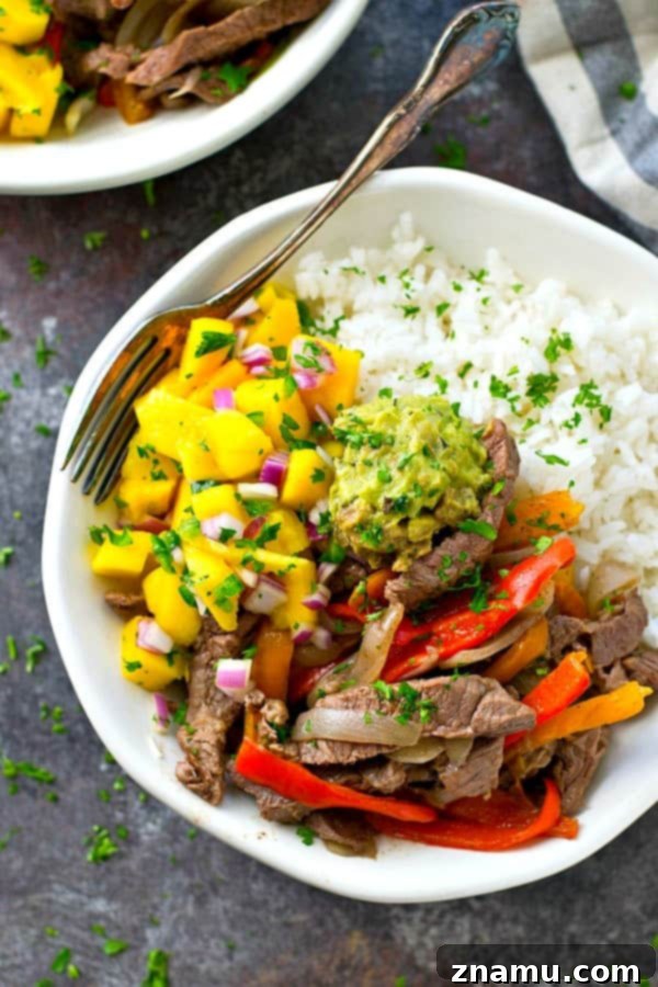 Steak and Peppers Rice Bowls with Mango Pico de Gallo 6 Fully assembled Steak and Peppers Rice Bowl topped with generous mango pico de gallo and guacamole.