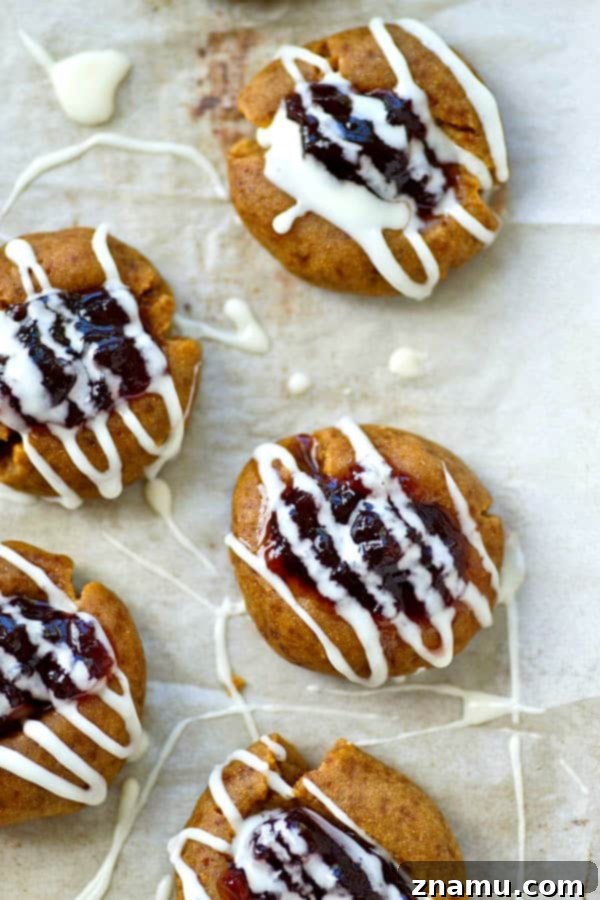 Blueberry Pie Thumbprint Jewels 3 Buttery shortbread cookies are filled with a homemade blueberry pie filling and drizzled with tons of glaze.---it's impossible to only eat one of these thumbprint cookies!