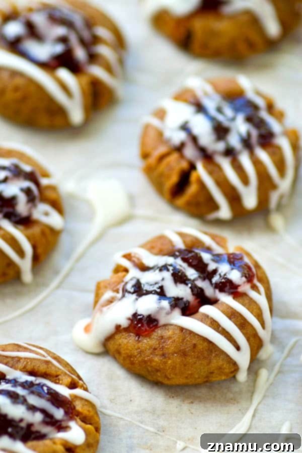 Blueberry Pie Thumbprint Jewels 4 Buttery shortbread cookies are filled with a homemade blueberry pie filling and drizzled with tons of glaze.---it's impossible to only eat one of these thumbprint cookies!